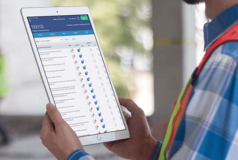 Site inspection interface showing quality control checklists, defect flagging, and compliance tracking